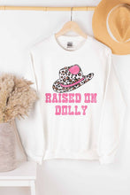 RAISED ON DOLLY GRAPHIC SWEATSHIRT