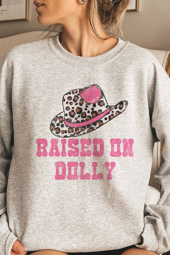 RAISED ON DOLLY GRAPHIC SWEATSHIRT