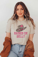 RAISED ON DOLLY GRAPHIC TEE - 9 Colors