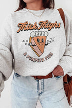 THICK THIGHS AND PUMPKIN PIES GRAPHIC SWEATSHIRT